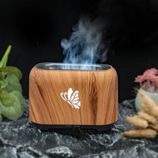 humidificador de madera con efecto de llamas y diseño de mariposa